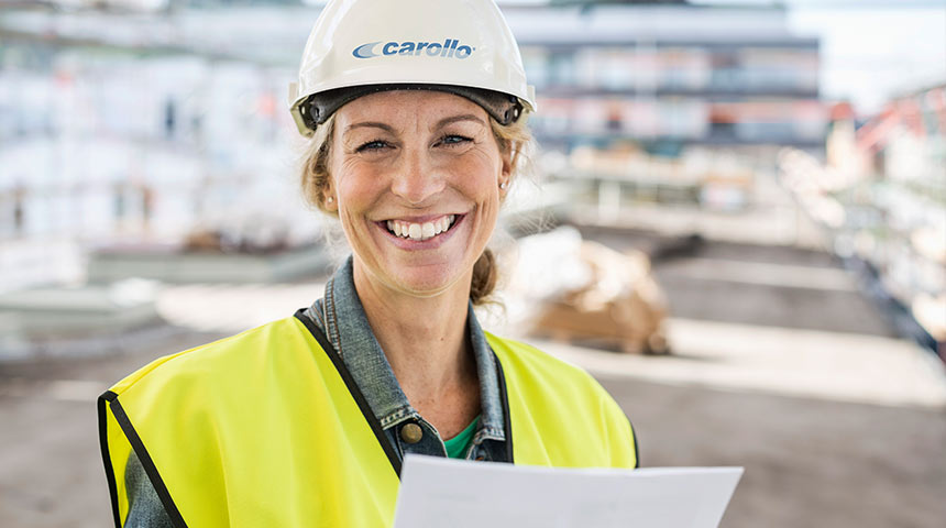 Woman smiling on job site